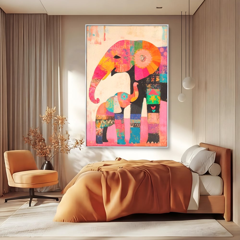 Tablou canvas cu tablou pictura cu elefanti colorati, in rama de aluminiu argintiu, pe perete intr-un dormitor
